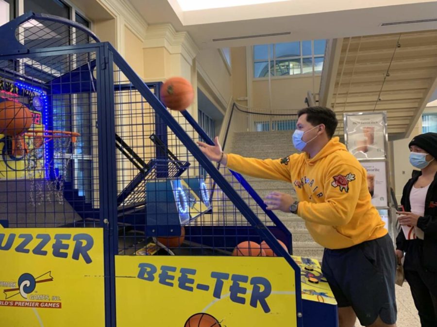Students shot basketball at the Buzzer Bee-ter arcade game in Brown Lupton University Union. (Courtesy of theCrew)