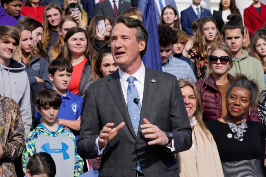 Virginia Gov. Glenn Youngkin speaks prior to signing a bill that bans mask mandates in public schools in Virginia on the steps of the Capitol Wednesday Feb. 16, 2022, in Richmond, Va. (AP Photo/Steve Helber)