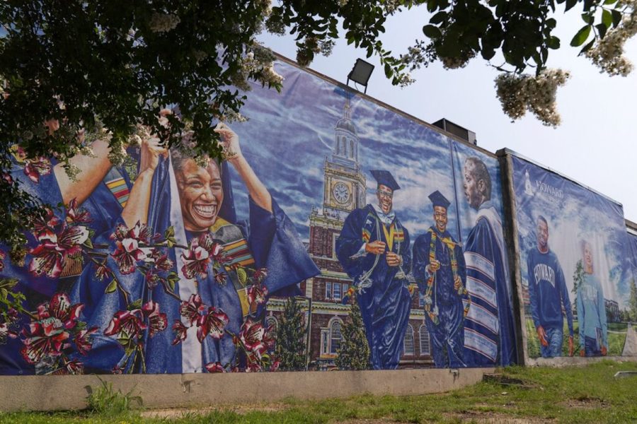 FILE - A graduation-themed printed mural is seen on the Howard University campus, July 6, 2021, in Washington. At least six historically Black universities in five states and the District of Columbia were responding to bomb threats Monday, Jan. 31, 2022 with many of them locking down their campuses for a time. Howard University was also the subject of a bomb threat before dawn, but later gave an all-clear to students and staff, WTOP reported. (AP Photo/Jacquelyn Martin)