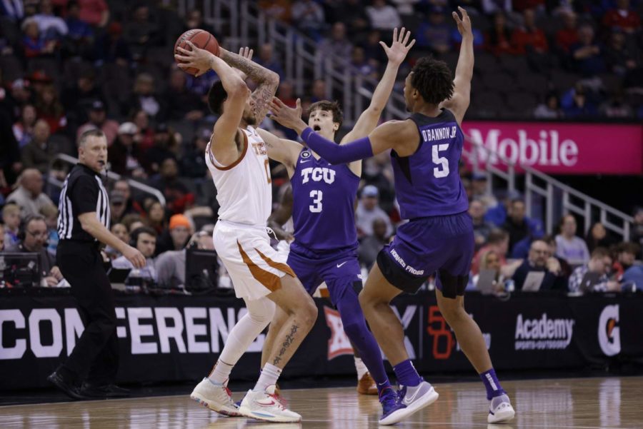 TCU's Francisco Farabello (3) and Chuck O'Bannon (5) defend Timmy Allen (0) of Texas in the Frogs' comeback win over the Longhorns in the Big 12 tournament quarterfinals on March 10, 2022. (Photo courtesy of gofrogs.com)
