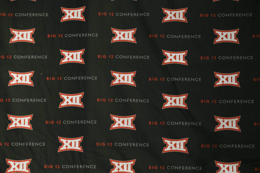 The Big 12 Conference logo is shown on a backdrop before a news conference in Grapevine, Texas, Monday, Oct. 17, 2016. The Big 12 Conference has decided against expansion from its current 10 schools after three months of analyzing, vetting and interviewing possible new members.(AP Photo/LM Otero)