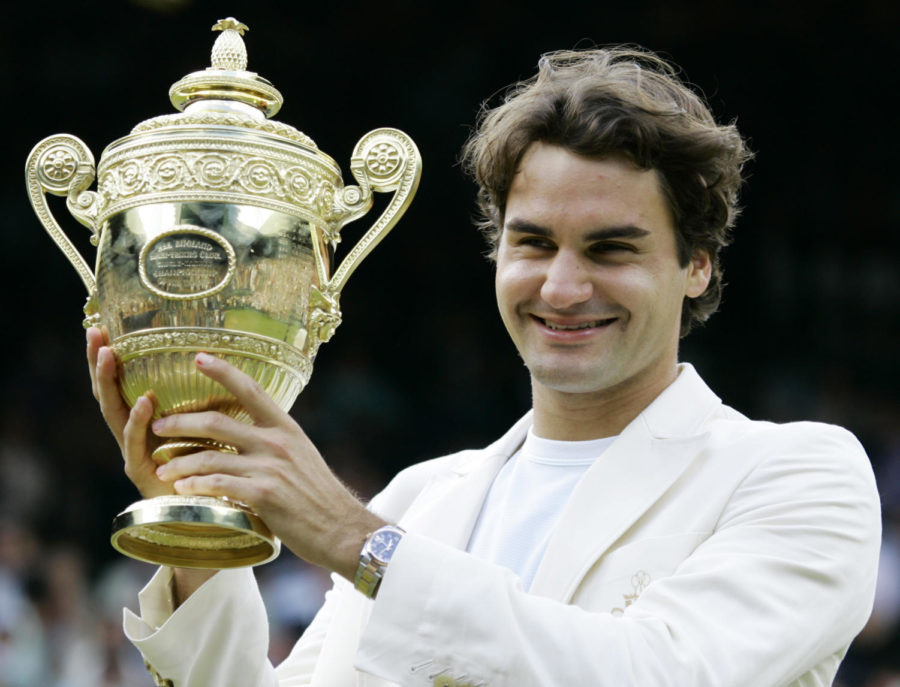 Roger Federer holds the winners trophy after his  victory over Spains Rafael Nadal in the Mens Singles final on the Centre Court at Wimbledon, Sunday July 9, 2006. (AP Photo/Anja Niedringhaus, File)