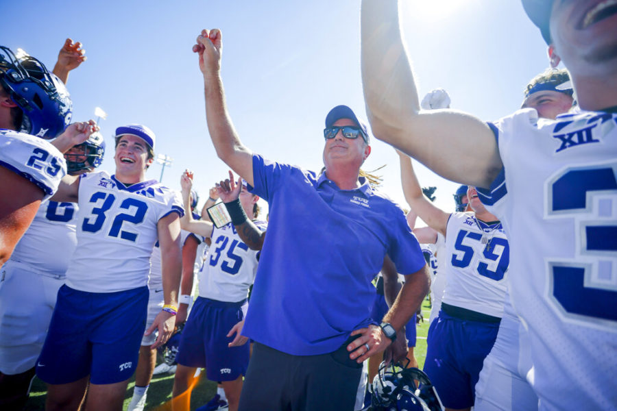TCU head coach Sonny Dykes celebrates a victory over SMU with his team after an NCAA college game on Saturday, Sept. 24, 2022, in Dallas, Texas. (AP Photo/Gareth Patterson)