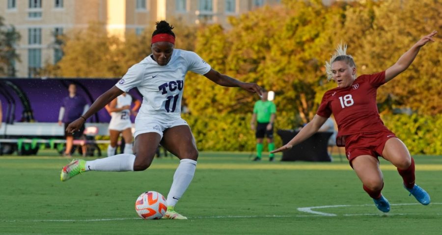 TCU+forward+Messiah+Bright+battles+with+a+Harvard+defender+on+Sept.+17%2C+2022.+%28photo+courtesy+of+gofrogs.com%29
