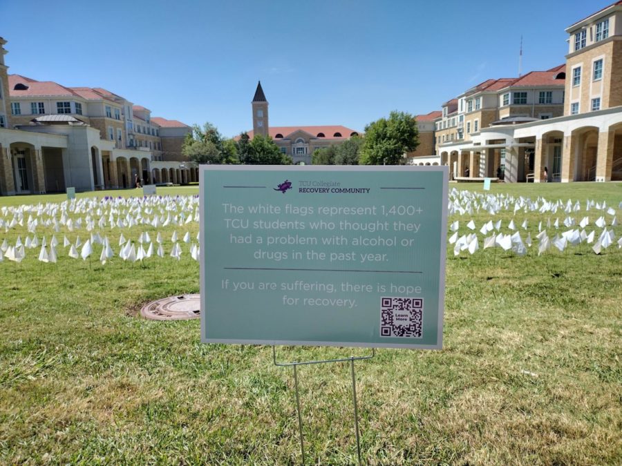 Flag display in the TCU Commons representing statistics of TCU students in recovery. (Allie Brown/TCU 360)