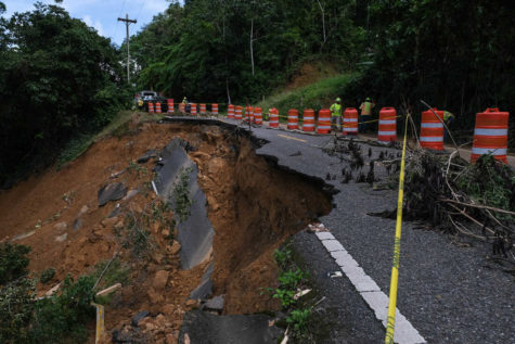 OROCOVIS, PR - SEPTEMBER 22: The 157 route into the community Cacao currently being cleared after mayor landslides caused by Hurricane Fiona blocked access.



(Photo by Gabriella N. Báez for NPR)