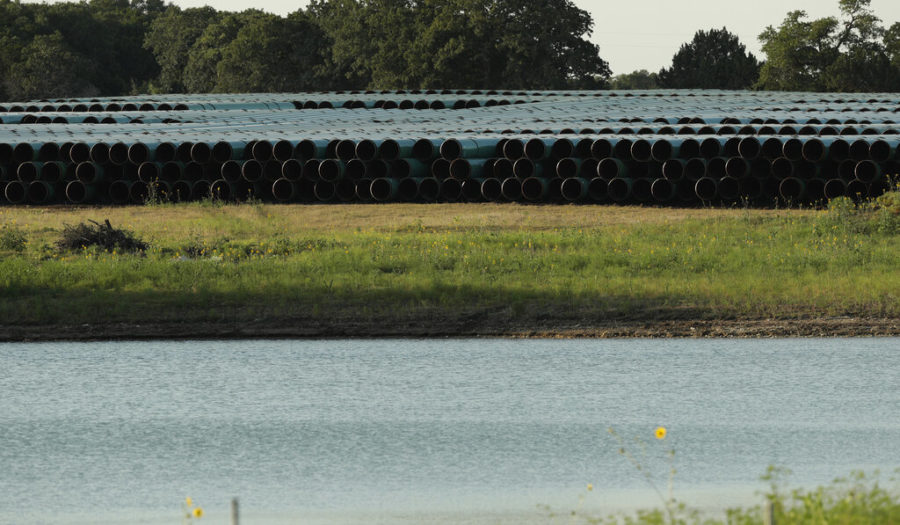 Pipes for a proposed new natural gas pipeline that would pass through the Texas Hill Country are staged near Blanco, Texas Friday, Aug. 2, 2019. A proposed pipeline is a 430-mile, $2 billion natural gas expressway that pipeline giant Kinder Morgan has mapped from the booming West Texas oil patch to Houston. (AP Photo/Eric Gay)