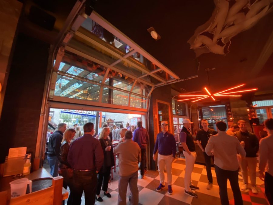 TCU alumni connect with each other at Guy Fieri’s Dive & Taco Joint in downtown Kansas City, Missouri. on Friday Oct. 7, 2022. (Photo courtesy of Tristen Smith)
