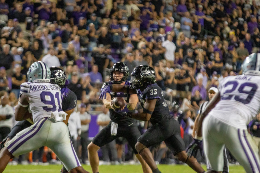QB Max Duggan hands the ball off in a game against Kansas State. Saturdays rematch against the Wildcats will be for the Big 12 Championship. Oct. 22, 2022. (Esau Rodriguez/Staff Photographer)