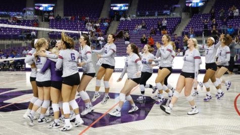 TCU volleyball celebrates after a win against Kansas on Oct. 26, 2022. (Photo courtesy of GoFrogs.com)