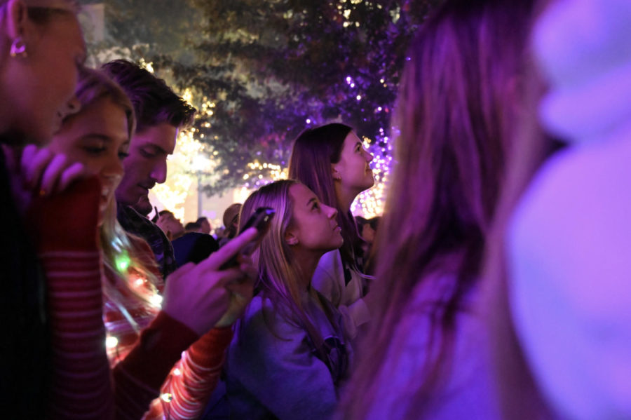 Students enjoy time out of class and homework stress, as the firework show goes off.  (Sophia Allen/Staff Photographer)