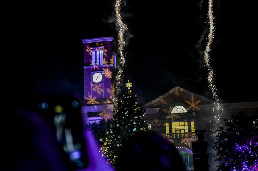 As the song Youre a Mean One Mr. Grinch plays over the loudspeakers sparklers are shot over the 2022 Christmas Tree.  (Sophia Allen/Staff Photographer)