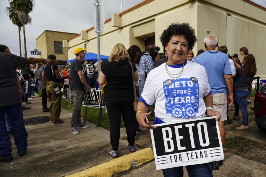 Supporter Janie Silva poses for a picture Tuesday, Nov. 1, 2022, at a stop on state gubernatorial candidate Beto ORourkes statewide Vote with Beto drive outside an early voting polling location in San Benito, Texas.(Denise Cathey/The Brownsville Herald via AP)