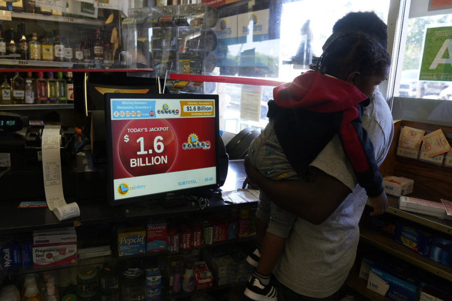 A+man+buys+lottery+tickets+ahead+of+the+Powerball+jackpot+drawing+at+the+Bluebird+Liquor+store+in+Hawthorne%2C+Calif.%2C+Saturday%2C+Nov.+5%2C+2022.++%28AP+Photo%2FDamian+Dovarganes%29