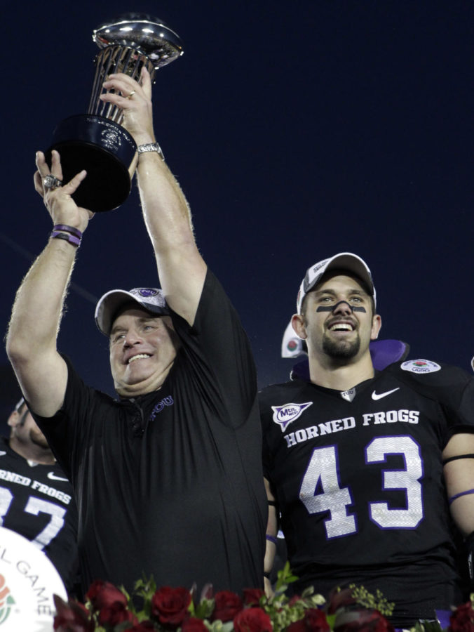 TCU head coach Gary Patterson, left, celebrates with TCU linebacker Tank Carder, right, defensive MVP, after winning the Rose Bowl NCAA college football game over Wisconsin, Saturday, Jan. 1, 2011, in Pasadena, Calif. TCU beat Wisconsin 21-19. (AP Photo/Jae C. Hong)
