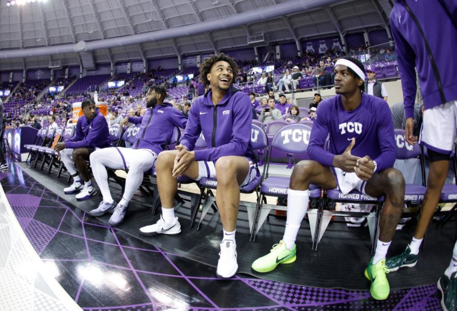 Guards+Mike+Miles+Jr.%2C+Damion+Baugh+and+forwards+Emanuel+Miller%2C+Chuck+OBannon+Jr.+prepare+for+starting+lineup+introductions+vs+Central+Arkansas+on+Dec.+28%2C+2022.+%28Photo+courtesy+of+GoFrogs.com%29