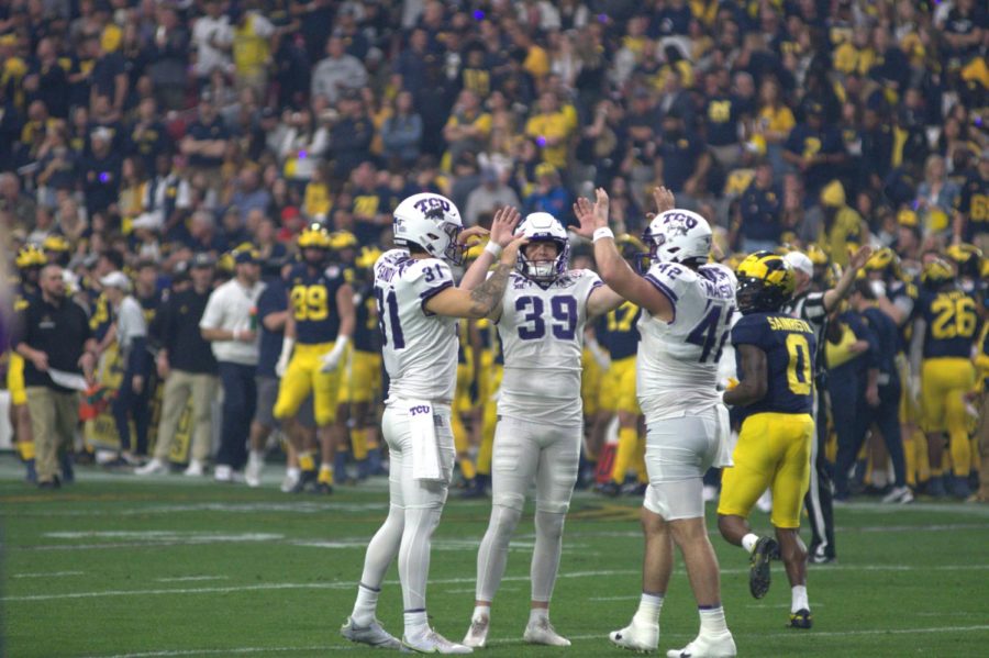 P Jordy Sandy and K Griffin Kell celebrate during the Fiesta Bowl against Michigan. (Tristen Smith/Staff Photographer) 