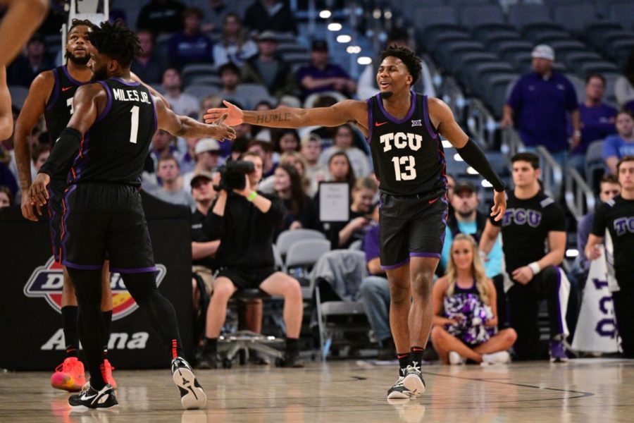 TCU guards Mike Miles Jr. and Shahada Wells embrace vs West Virginia on Jan. 18, 2023. (Photo courtesy of GoFrogs.com)