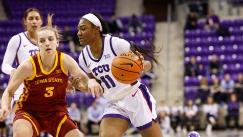 TCU guard Knisha Godfrey dribbles down the court in a 75-35 loss to Iowa State on Jan. 25, 2023. (Photo courtesy of GoFrogs.com)