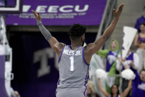 TCU guard Mike Miles Jr. (1) celebrates after sinking a basket in the second half of an NCAA college basketball game against Oklahoma State, Saturday, Feb. 18, 2023, in Fort Worth, Texas. (AP Photo/Tony Gutierrez)