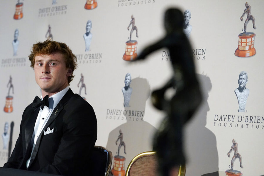 TCU quarterback Max Duggan sits with the Davey OBrien Award football in Fort Worth, Texas, Monday, Feb. 20, 2023. (AP Photo/LM Otero)