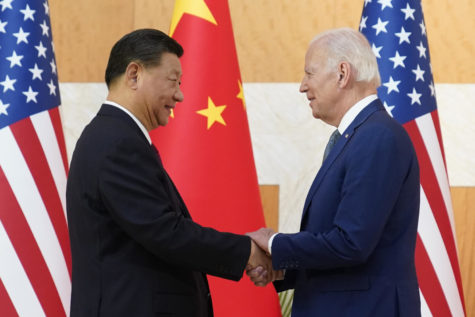 FILE - U.S. President Joe Biden, right, and Chinese President Xi Jinping shake hands before their meeting on the sidelines of the G20 summit meeting, Nov. 14, 2022, in Nusa Dua, in Bali, Indonesia. Just 40% of U.S. adults approve of how President Joe Biden is handling relations with China, a new poll shows, with a majority anxious about Beijings influence as the White House finds its agenda increasingly shaped by global rivalries. (AP Photo/Alex Brandon, File)