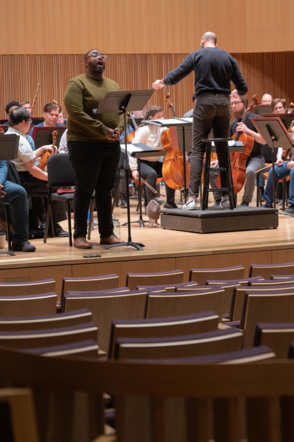Tenor Bernard Holcomb, left, and conductor/composer Geter, right, rehearse An African American Requiem with the Fort Worth Symphony Orchestra. Holcomb also sang in the Portland, Oregon, premiere last year. (Sally Verrando/Staff Photographer)