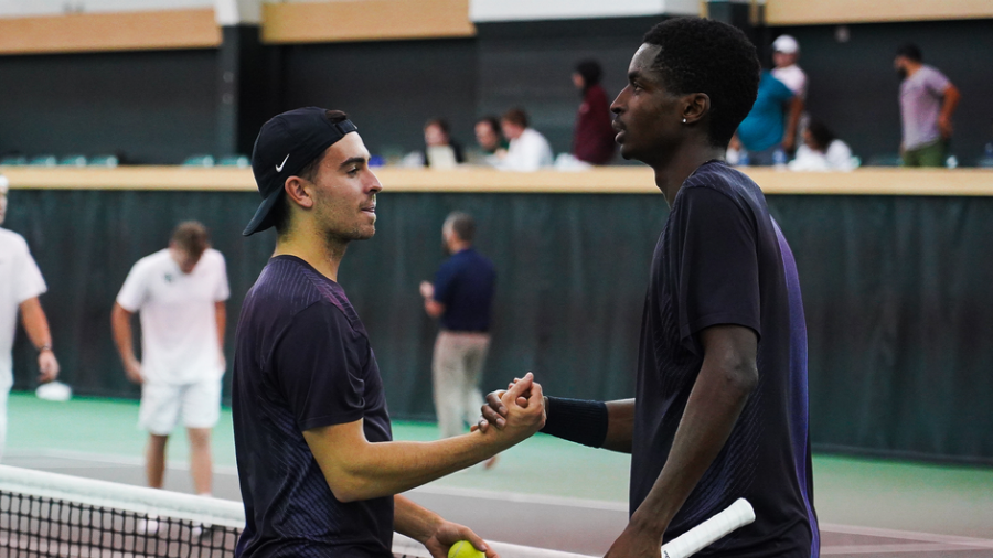 Pedro Vives and Luc Bomba  congratulate each other on the Hawkins Indoor Tennis Center courts Feb. 8, 2022. (Photo courtesy of GoFrogs.com)