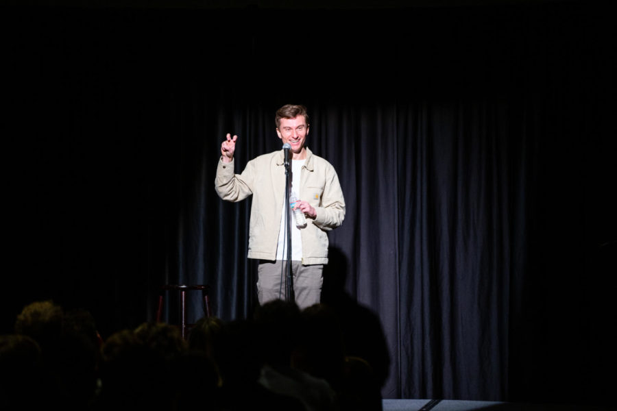 Comedian Trevor Wallace shows some TCU spirit at his comedy show presented by theEnd on Friday, Feb. 3. (Photo by Jillian Miller)