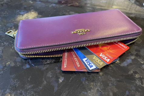 Credit cards are displayed at a residence in Fort Worth, Texas on Feb.17, 2023. Consumers are having to depend on their credit cards now more than ever due to inflation. (Sydney Brunson/Staff Writer)