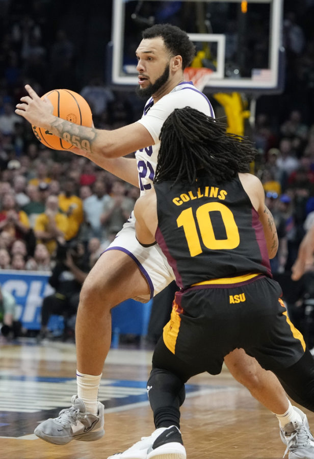 TCU forward JaKobe Coles, back, fields a pass as Arizona State guard Frankie Collins defends during the second half of a first-round college basketball game in the mens NCAA Tournament Friday, March 17, 2023, in Denver. Coles went on to score the go-ahead basket. (AP Photo/David Zalubowski)