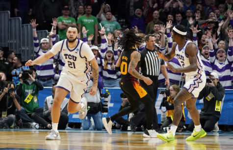 TCU forward JaKobe Coles, left, reacts aftwer hitting the go-ahead basket in the second half of the teams first-round college basketball game against Arizona State in the mens NCAA Tournament on Friday, March 17, 2023, in Denver. (AP Photo/John Leyba)