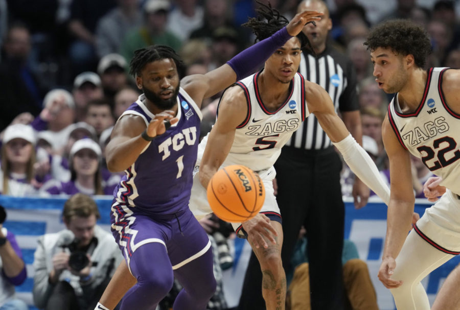 TCU+guard+Mike+Miles+Jr.%2C+left%2C+loses+control+of+the+ball+as+Gonzaga+guard+Hunter+Sallis%2C+center%2C+and+forward+Anton+Watson+defend+in+the+second+half+of+a+second-round+college+basketball+game+in+the+mens+NCAA+Tournament+Sunday%2C+March+19%2C+2023%2C+in+Denver.+%28AP+Photo%2FDavid+Zalubowski%29