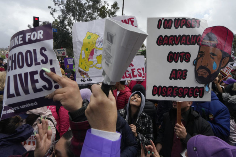 Los+Angeles+Unified+School+District+teachers+and+Service+Employees+International+Union+99+%28SEIU%29+members+strike+outside+the+LAUSD+headquarters+in+Los+Angeles%2C+Tuesday%2C+March+21%2C+2023.+Tens+of+thousands+of+workers+in+the+Los+Angeles+Unified+School+District+walked+off+the+job+Tuesday+over+stalled+contract+talks%2C+and+they+were+joined+by+teachers+in+a+three-day+strike+that+shut+down+the+nations+second-largest+school+system.+%28AP+Photo%2FDamian+Dovarganes%29