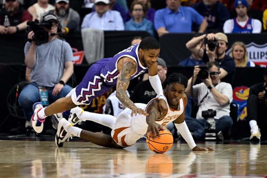 TCU guard Rondel Walker dives for a loose ball vs Texas on March 10, 2023. (Photo courtesy of GoFrogs.com)