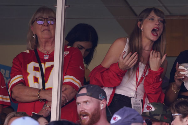 File - Taylor Swift, right, watches from a suite alongside Travis Kelces mother, Donna Kelce, inside Arrowhead Stadium during the first half of an NFL football game between the Chicago Bears and Kansas City Chiefs Sunday, Sept. 24, 2023, in Kansas City, Mo.  Following the 12-time Grammy Award winners appearance at the game, jersey sales for the All-Pro tight-end seemingly skyrocketed. (AP Photo/Ed Zurga, File)
