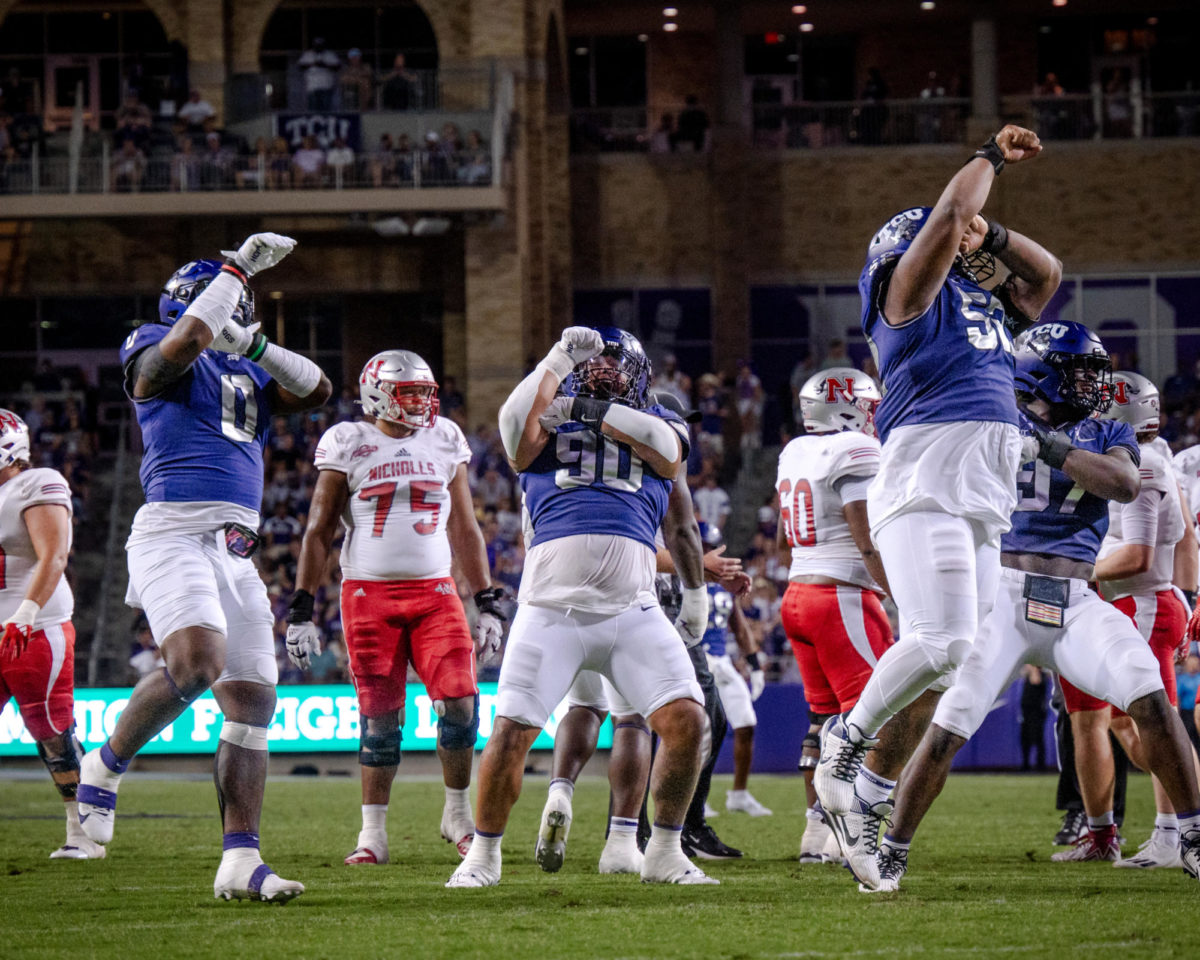The+Texas+Christian+University+Horned+Frog+defense+celebrates+a+play+at+Amon+G.+Carter+Stadium+in+Fort+Worth%2C+Texas%2C+Sept.+9%2C+2023.