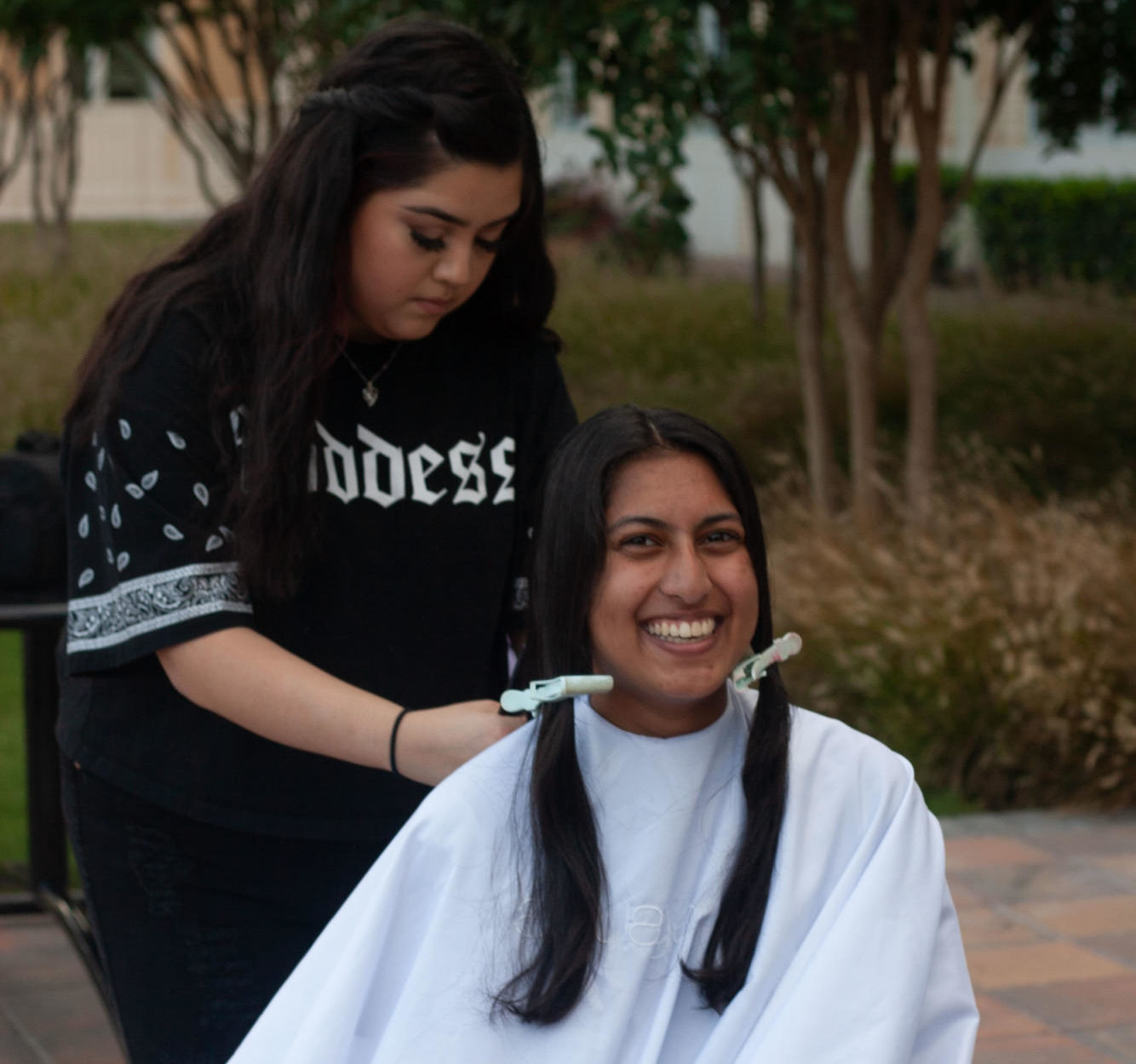 TCU Student donates eight inches of hair at past hair donation drive. (Courtesy of: Andre Giammattei)