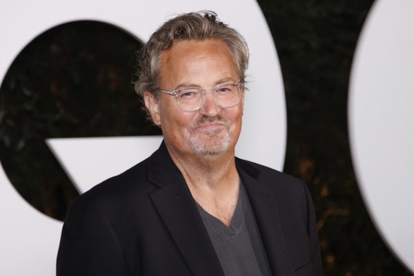 FILE - Matthew Perry arrives at the GQ Men of the Year Party on Thursday, Nov.17, 2022, in West Hollywood, Calif. Perry, who starred as Chandler Bing in the hit series “Friends,” has died. He was 54. The Emmy-nominated actor was found dead of an apparent drowning at his Los Angeles home on Saturday, according to the Los Angeles Times and celebrity website TMZ, which was the first to report the news. Both outlets cited unnamed sources confirming Perry’s death. His publicists and other representatives did not immediately return messages seeking comment. (Photo by Willy Sanjuan/Invision/AP, File)