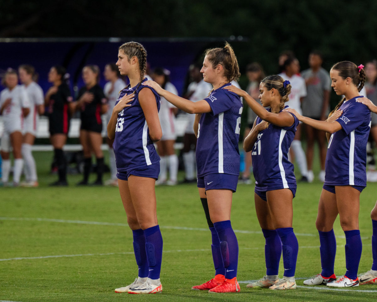 The Texas Christian University Soccer Team takes a moment for the national anthem at the Garvey-Rosenthal Soccer Stadium in Fort Worth, Texas, Oct. 12, 2023. The TCU Horned Frogs tied the Houston Cougars 2-2. (TCU 360/ Shane Manson)