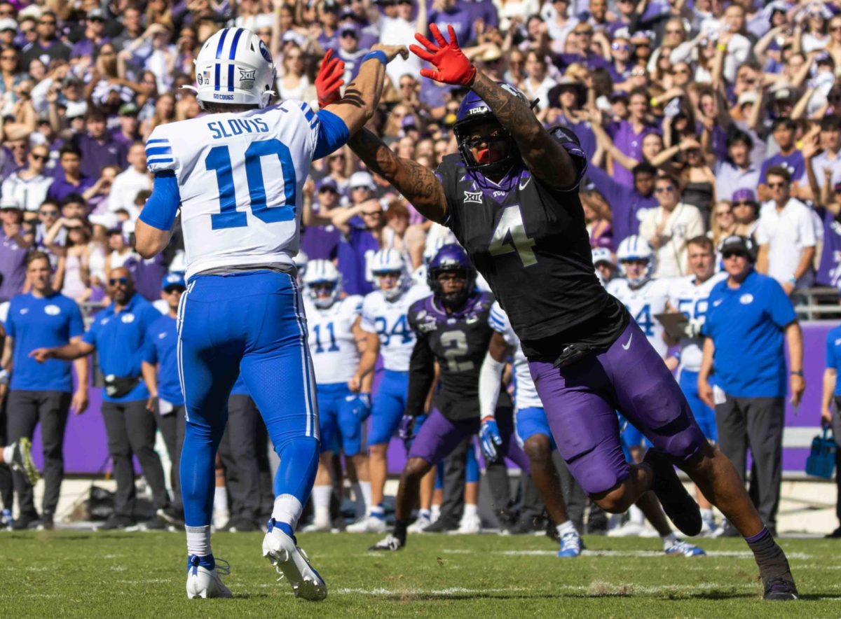 Texas Christian University linebacker Namdi Obiazor tries to deflect the pass attempt at Amon G. Carter Stadium in Fort Worth, Texas, on October 14th, 2023. The TCU Horned Frogs beat the BYU Cougars 44-11. (TCU360/ Tyler Chan)