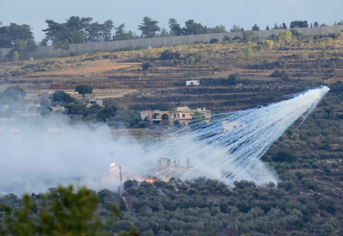 Israel+fired+artillery+along+its+northern+border+with+Lebanon+on+Sunday+amid+intense+clashes+with+Hezbollah.+%28Credit%3A+Hussein+Malla%2FAssociated+Press%29