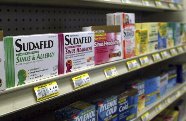 FILE - Sudafed and other common nasal decongestants on display behind the counter at Hospital Discount Pharmacy in Edmond, Okla. (AP Photo, File)