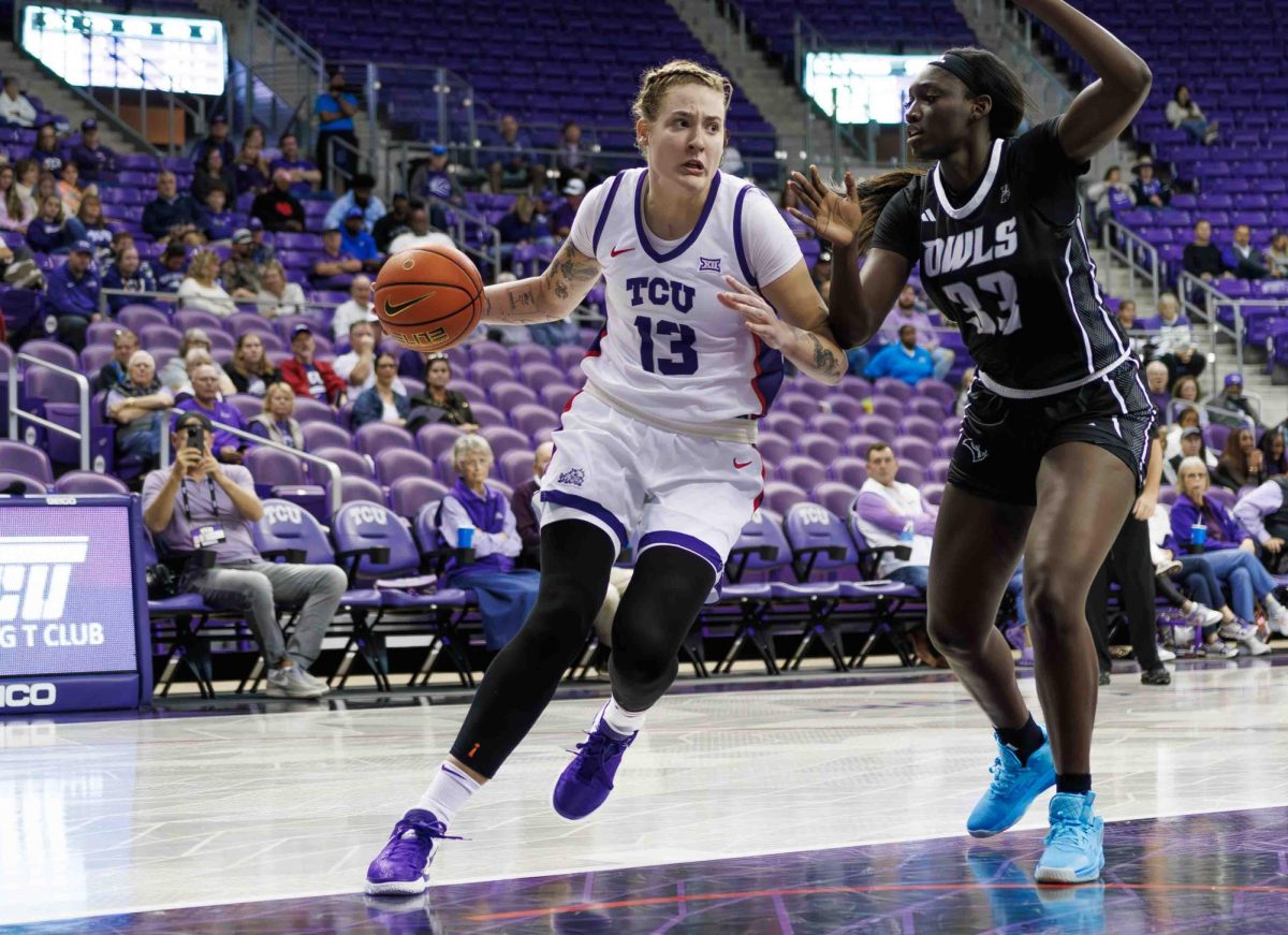 TCU center Sedona Prince drives to the basket at Ed and Rae Schollmaier Arena in Fort Worth, Texas on November 12th, 2023. The TCU Horned Frogs beat the Rice Owls 67-42. (TCU360/Tyler Chan)
