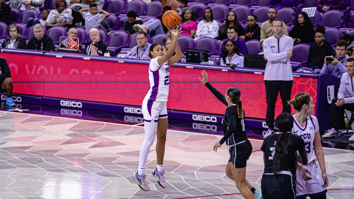 TCU WBB forward Aaliyah goes up for a three-point shot. (photo courtesy of: gofrogs.com)