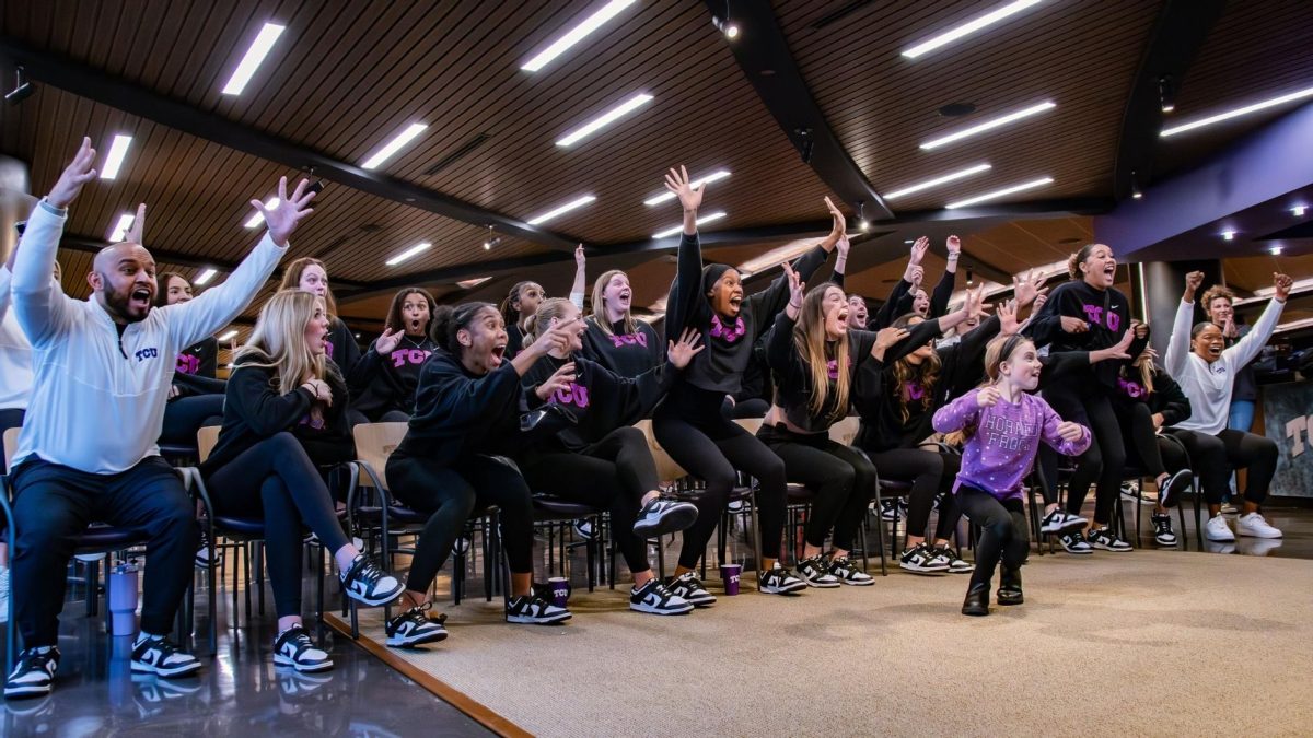 The TCU Volleyball team celebrating after receiving their bid for the NCAA Tournament.