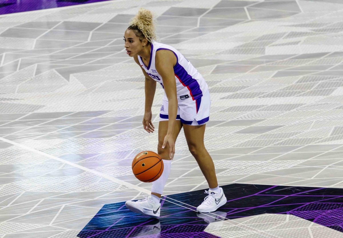 TCU guard Jaden Owens dribbles the ball past half court at Ed and Rae Schollmaier Arena in Fort Worth, Texas on December 1st, 2023. The TCU Horned Frogs beat the Tulsa Golden Hurricane 82-50. (TCU360/ Tyler Chan)