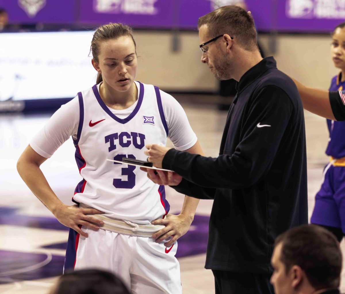 TCU guard Madison Conner talks with Coach Mark Campbell at Ed and Rae Schollmaier Arena in Fort Worth, Texas on December 10th, 2023. The TCU Horned Frogs beat the PVAMU Panthers  86-41. (TCU360/ Tyler Chan)