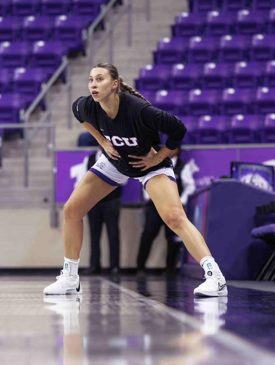 TCU Forward Sarah Sylvester stretches before the game at Ed and Rae Schollmaier Arena in Fort Worth, Texas on January 23rd, 2024. The TCU Horned Frogs beat the UCF Knights 66-60. (TCU360/Tyler Chan)