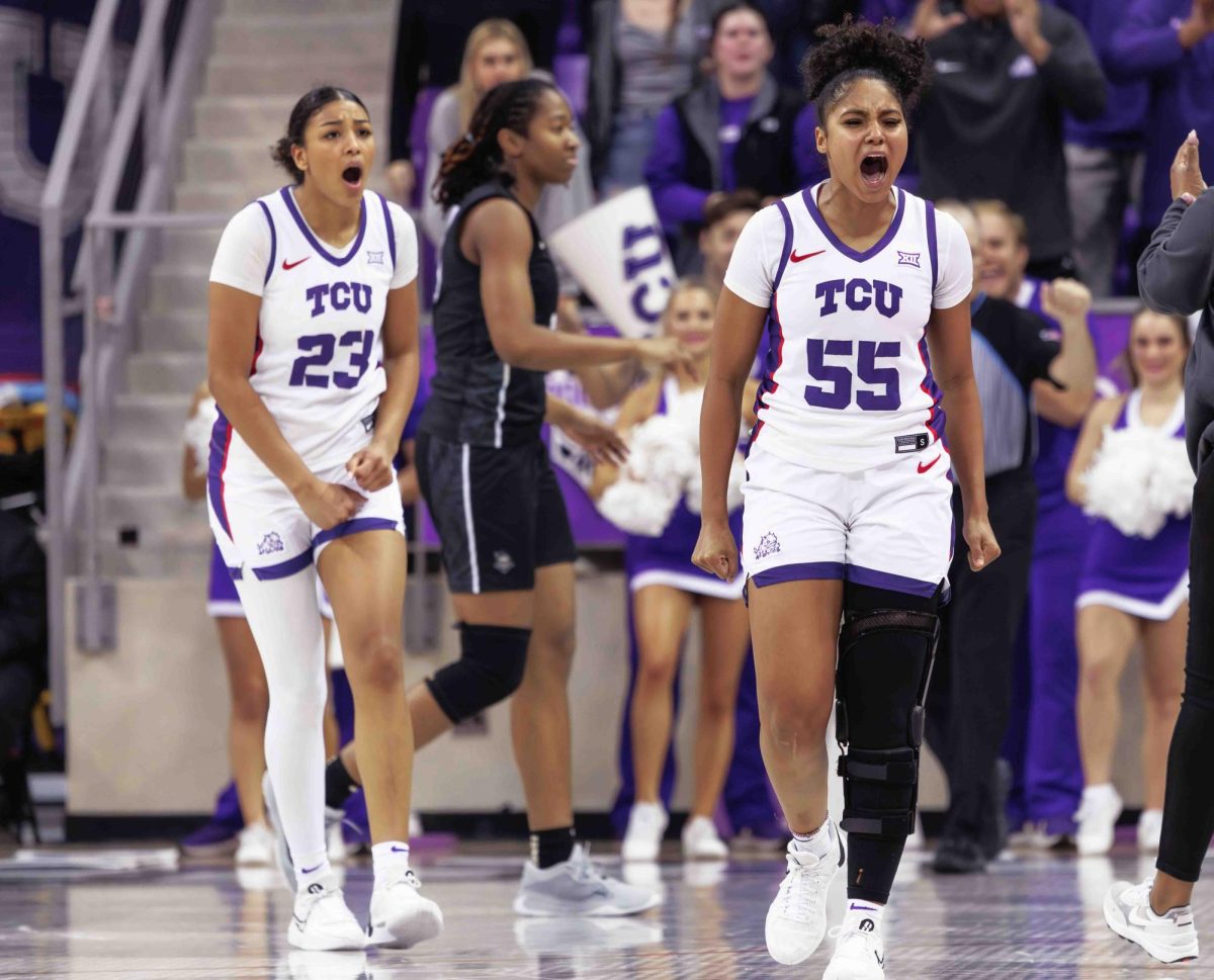 TCU Guard Victoria Flores and Forward Aaliyah Robinson celebrate at Ed and Rae Schollmaier Arena in Fort Worth, Texas on January 23rd, 2024. The TCU Horned Frogs beat the UCF Knights 66-60. (TCU360/Tyler Chan)